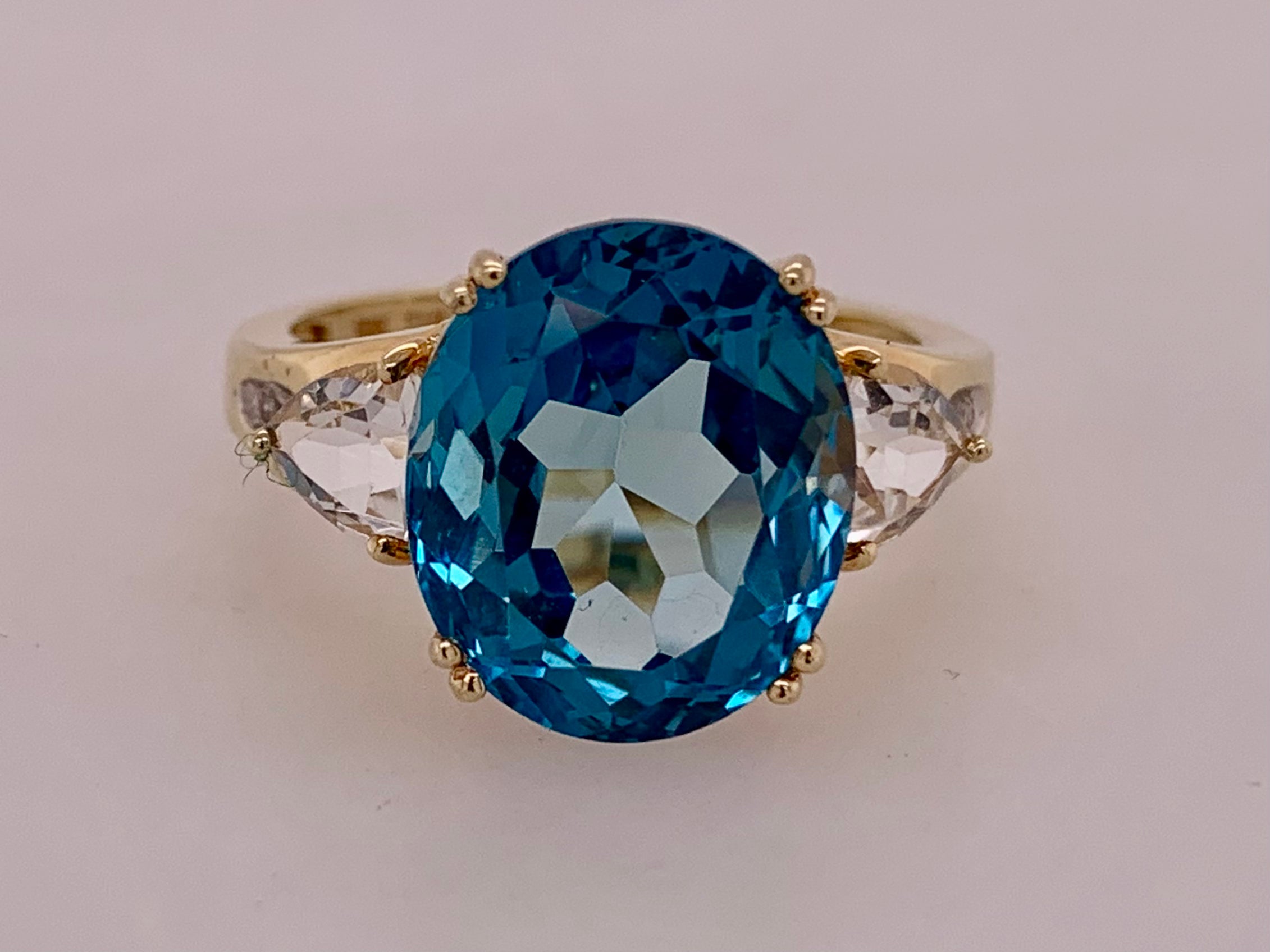 Blue topaz ring price deals