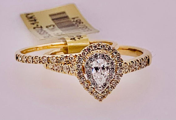 14K .62 Carat TW Pear Shaped Diamond Engagement Set
